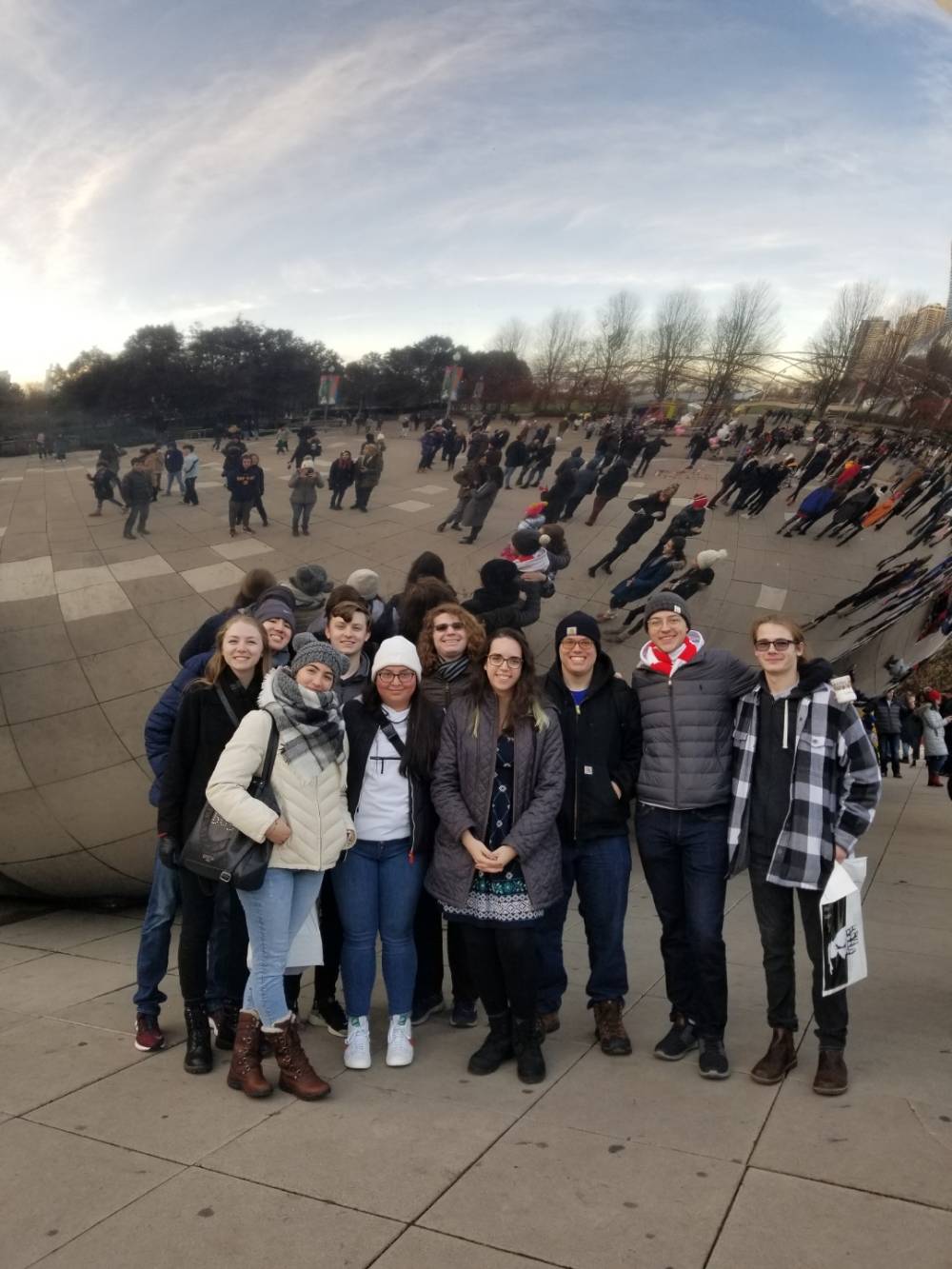 Language students in front of the bean sculpture in Millennium Park in Chicago